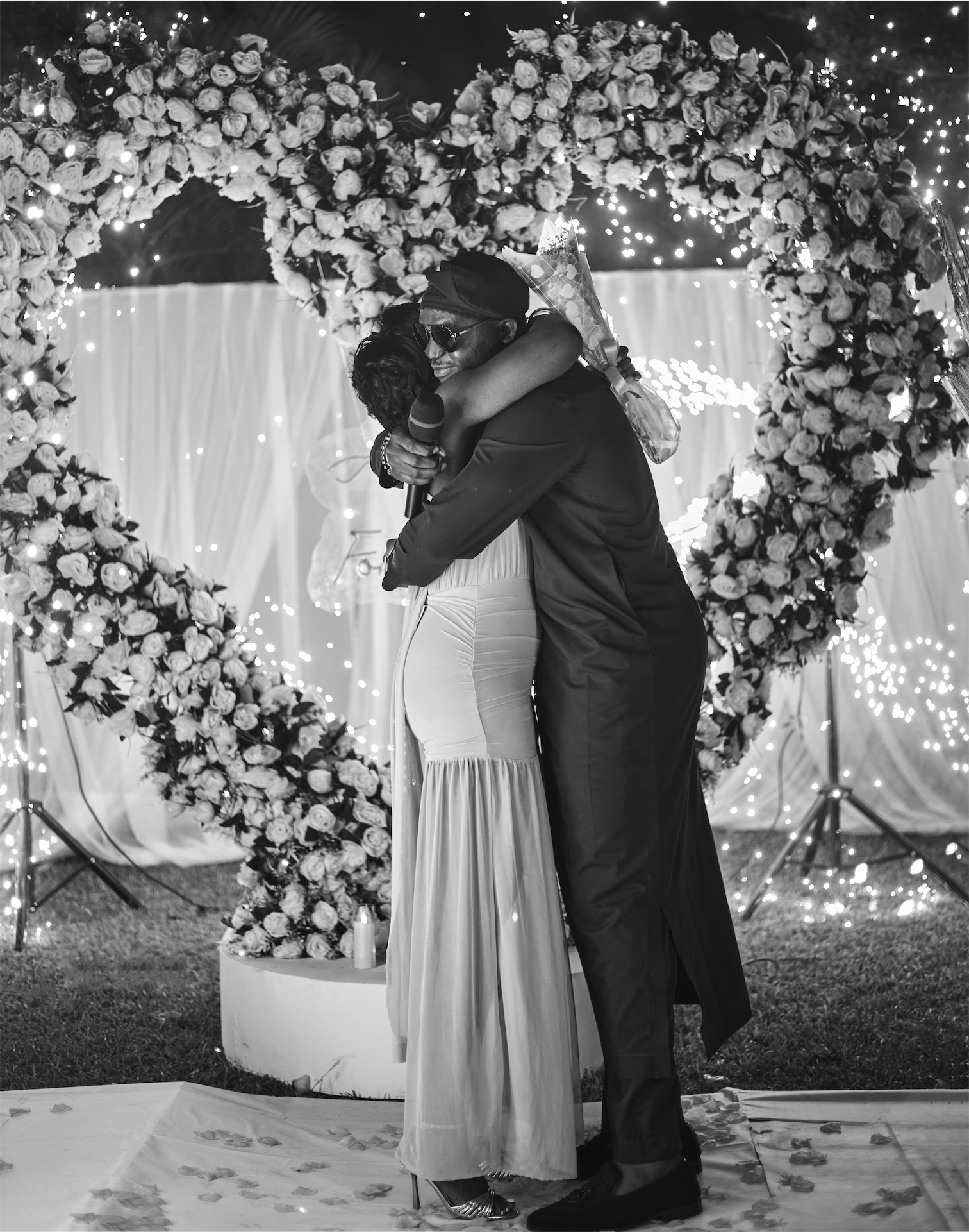 Olaide and Olumuyiwa embrace