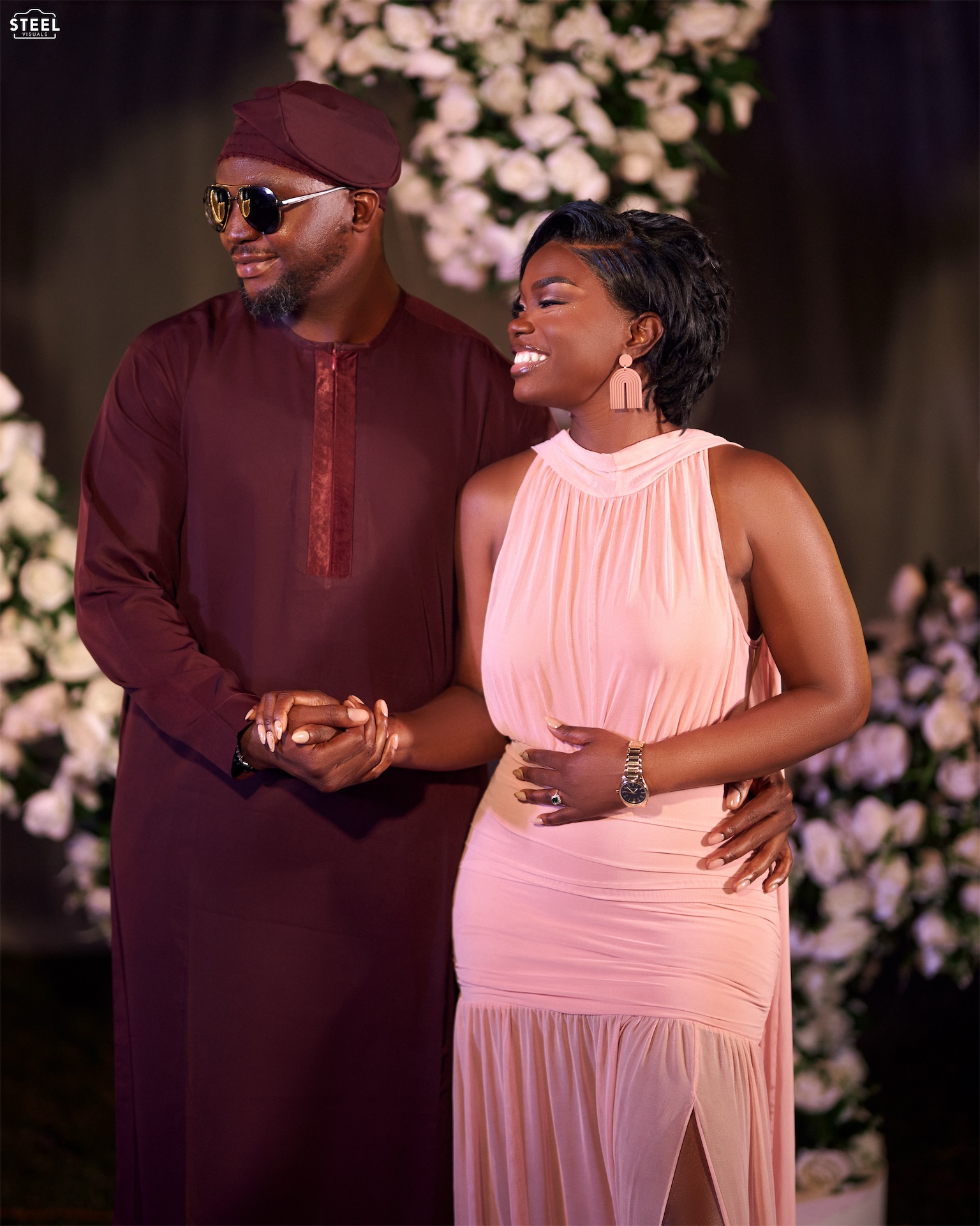 Couple holding hands